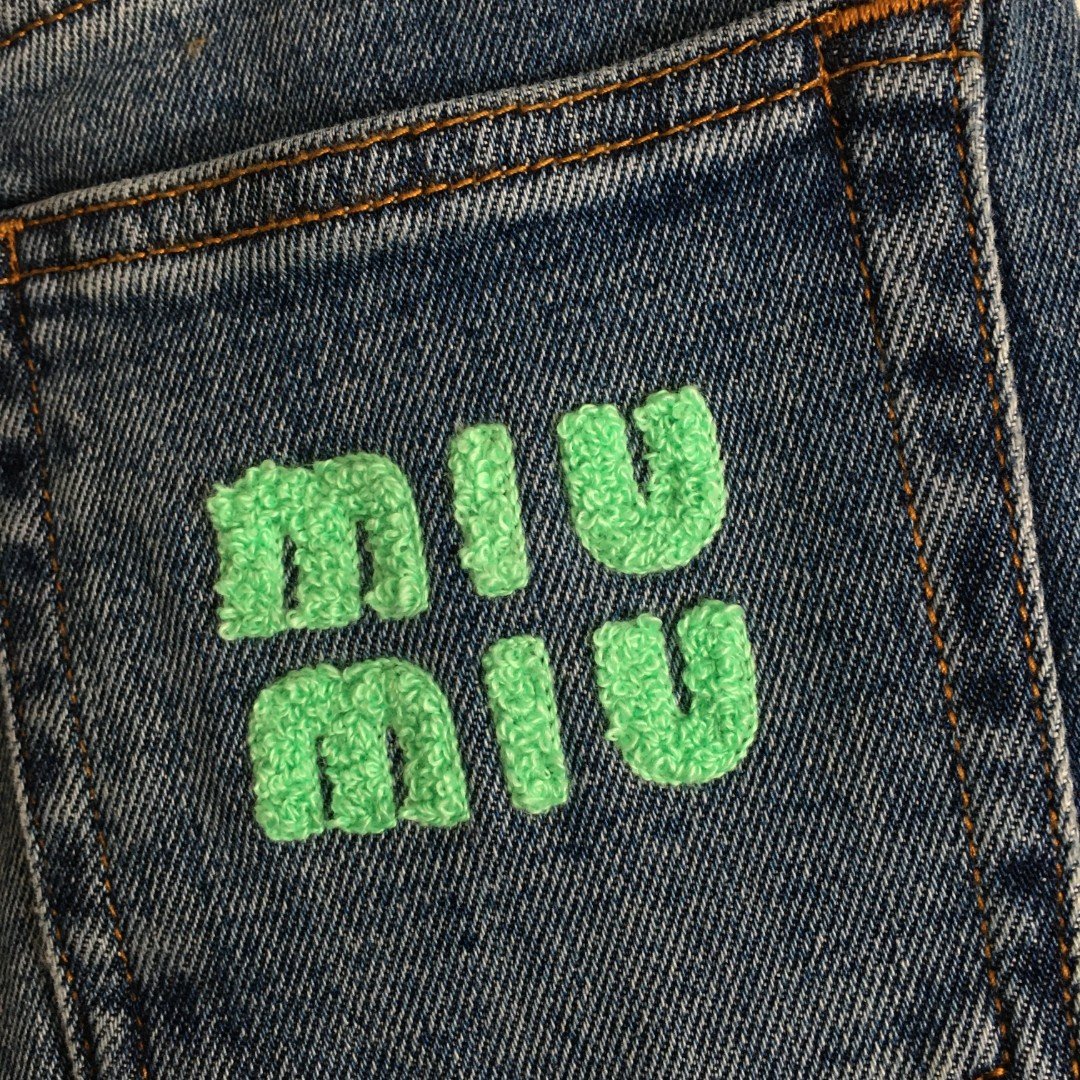 MIUMIU Irregular Cuff Denim Pants W6011001 - Image 3